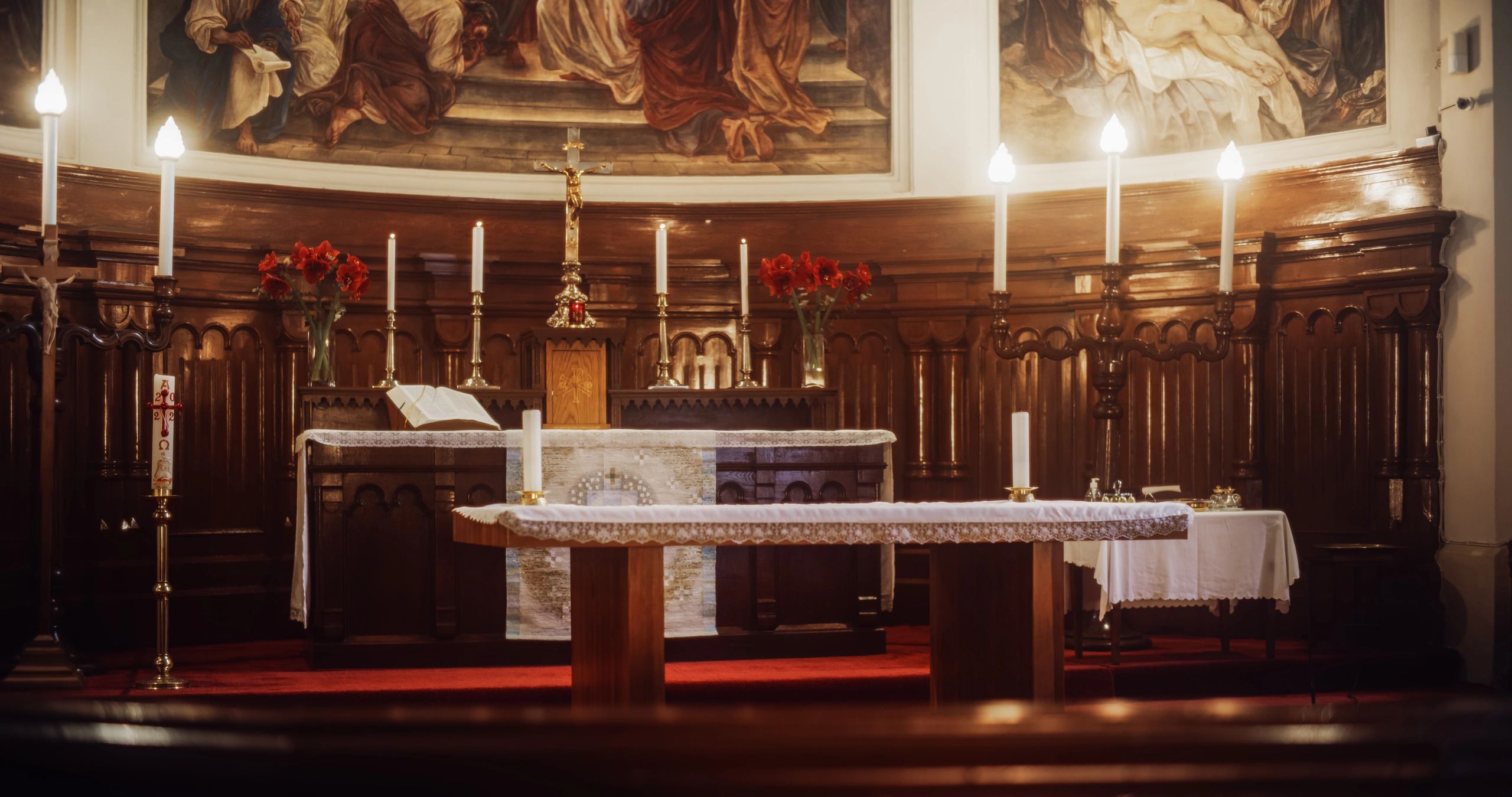 Church altar with candles and cross