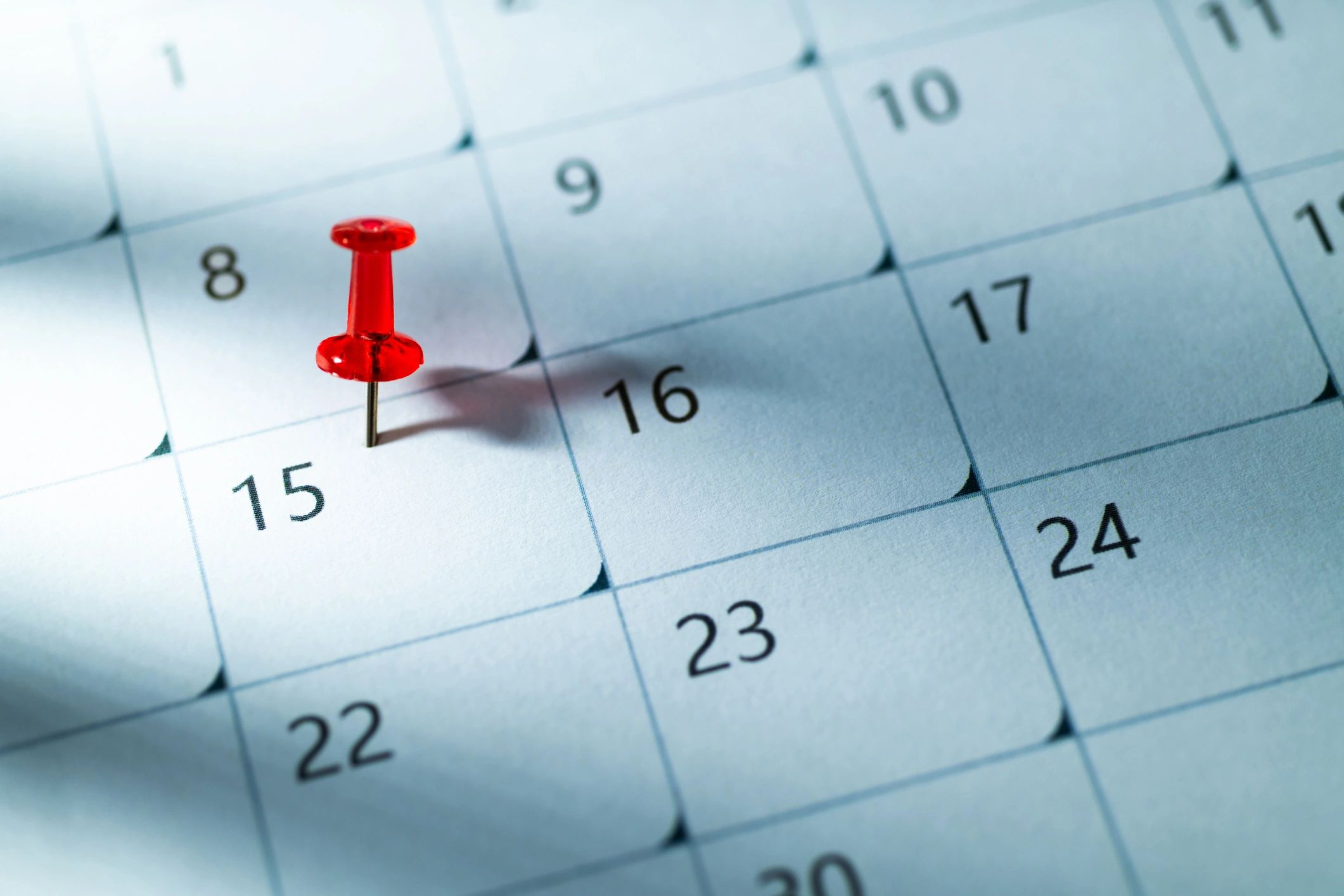 Calendar date marked with a red pin