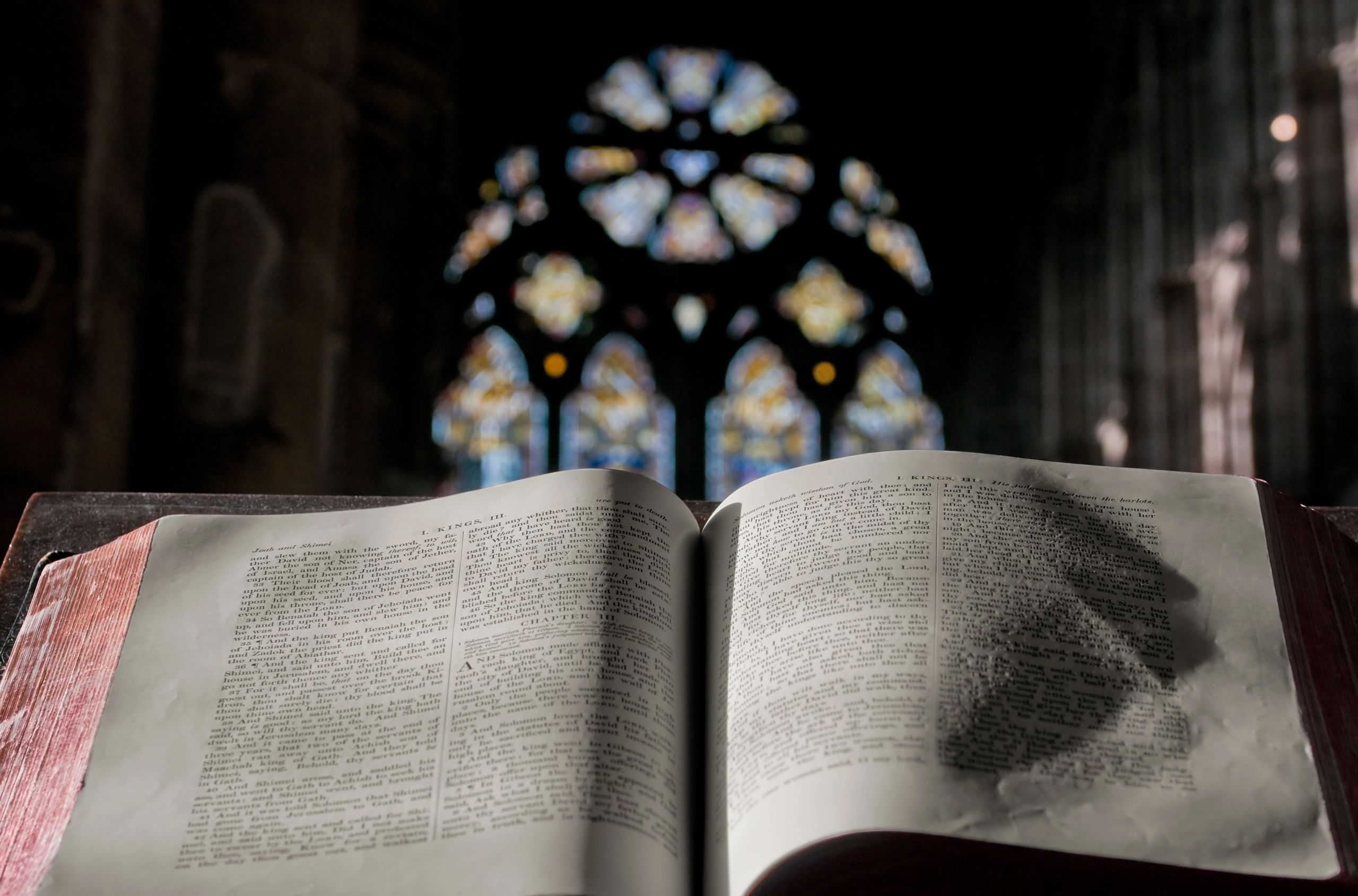 Open prayer book on a church lectern during a service